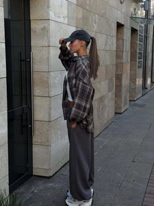 Casual loose plaid shirt for women with wide-leg pants and street style aesthetic