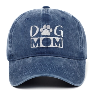 Detailed close-up of navy blue washed cotton baseball cap with Dog Mom embroidery