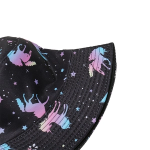 Detailed view of black bucket hat featuring colorful unicorn and star pattern print