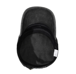Detail view of washed cotton army cap interior showing sweatband and 100% cotton label