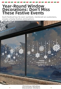 Macro view of white snowflake static stickers and Merry Christmas lettering on a window
