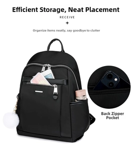 Detail view of black nylon backpack featuring anti-theft back pocket and side umbrella pocket