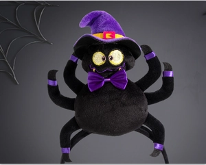 Detail of plush black spider headband with purple wizard hat and bow for Halloween parties