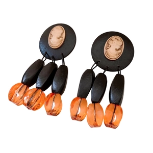 Vintage oval cameo drop earrings with wood beads and orange crystal tassels in retro style