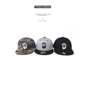 Three snapback baseball caps featuring cartoon beard man embroidery in camo, gray and black