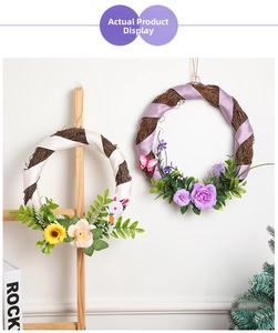 Detailed view of handmade Christmas wreaths with silk ribbons, sunflowers and roses
