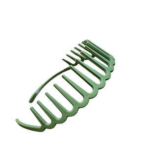 Light green wide frosted headband with wavy teeth for styling and facial washing