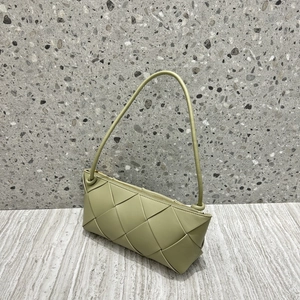 Olive green woven leather shoulder bag with knot design and minimalist crossbody style