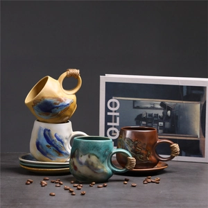 Artistic splash-ink ceramic mugs with hemp rope handles in yellow, white, green and brown