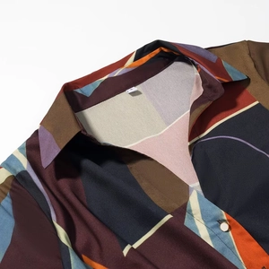 Geometric print long sleeve button-down shirt featuring a colorful abstract pattern