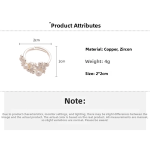 Detail view of flower ring dimensions 2x2cm made of copper and cubic zirconia with pearls