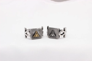 Detailed comparison of vintage Masonic steel rings with gold and silver All-Seeing Eye