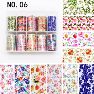 Nail art transfer foil set with 10 rolls of floral patterns in a transparent storage box