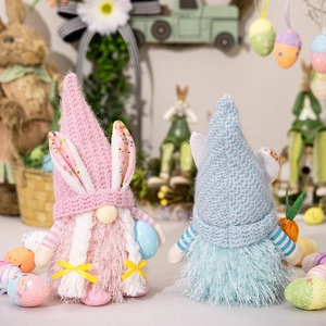 Detail of Easter gnomes with knit hats, bunny ears, plush beards and carrot accessories