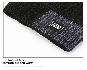 Macro shot of thick chenille knit texture and G2 woven label on winter beanie cap