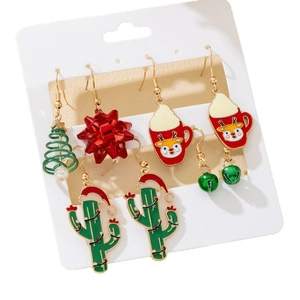 Christmas earring set featuring festive green trees, red reindeer mugs and cacti designs