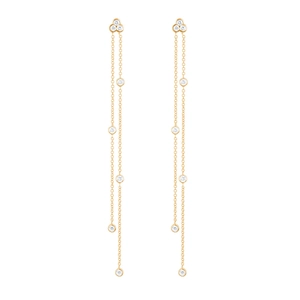 Detail view of long tassel chain earrings with shimmering triangular zircon stones