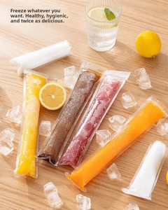 Close-up of food-grade transparent popsicle bags filled with juice and fresh fruits