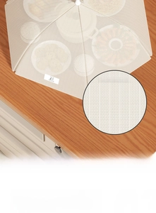 Detail of beige foldable food cover with fine mesh for anti-fly and oil-proof kitchen use