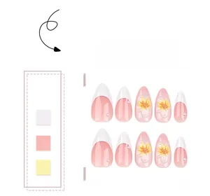 Detail of almond French press on nails with 3D yellow flowers and pearl accents