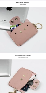 Pink pebbled leather card wallet with gold hardware keychain and dual snap closure