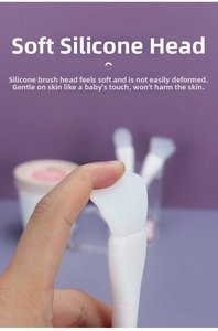 Macro shot showing the flexibility of the soft silicone head on this facial mask brush