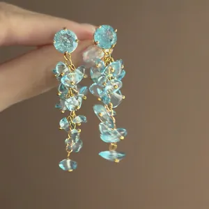Blue petal tassel earrings with gold metal links for elegant summer beach resort style