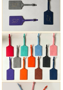Detailed flat lay of colorful PU leather luggage tags with buckle straps and plane heart motifs