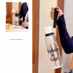 Detail view of 500ml transparent portable sports water bottle with Fashion in cup print