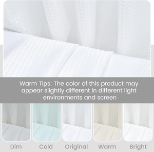 Detail of white waffle shower curtain showing polka dot texture in various lighting conditions