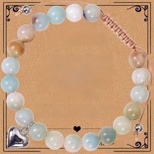 Detail of teacher gift bracelet with heart charm and natural zebra stones on poem card