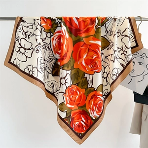 Detailed view of 90cm square silk scarf featuring rose print and contrast borders