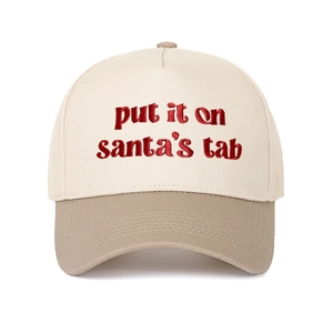 Detail of red Santa's Tab embroidery on a two-tone beige and khaki baseball cap