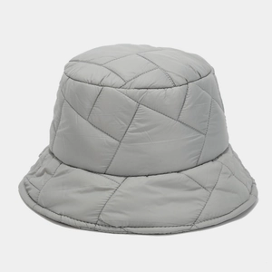 Close-up of gray quilted winter bucket hat showing detailed fabric texture and stitching