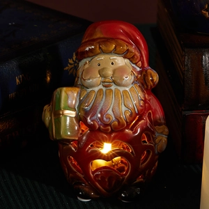 Glow Santa ceramic figurine with heart cutouts and warm light for Christmas decor