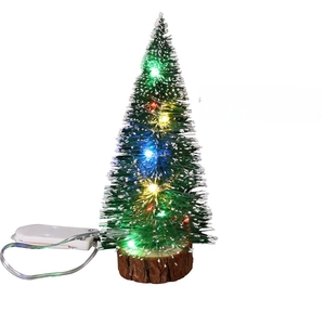 Mini tabletop Christmas tree with fake snow, natural wood base and colorful LED lights