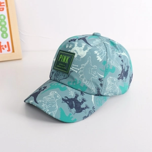 Detail of gray-blue kids baseball cap with green dinosaur prints and square logo label