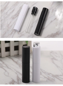 Detail view of 10ml refillable perfume spray bottle with glass liner and twist mechanism