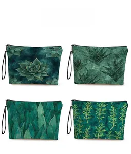 Detail display of four botanical pattern canvas bags with black zippers and carry straps