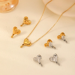 Minimalist fluid heart jewelry set with 18K gold and silver plated titanium earrings