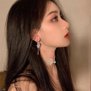 Lace choker with pearl and purple stone drop earrings shown on model for elegant style