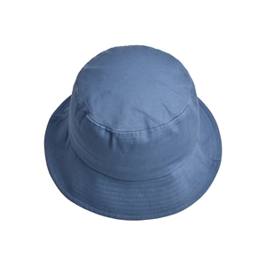 Detail of blue canvas bucket hat showing reinforced stitching and cotton fabric texture