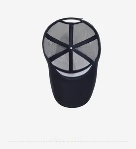 Detail view of the breathable mesh interior and sweatband of the navy baseball cap