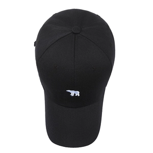 Classic black baseball cap with white polar bear embroidery and curved brim in twill cotton