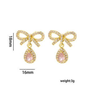 Golden bow earrings with pink teardrop crystals, 18mm length and 16mm width measurements