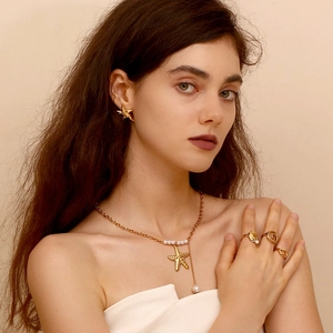 Gold-plated starfish and pearl necklace set with matching earrings and rings for women