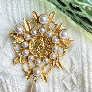 Vintage gold pearl brooch featuring Queen Elizabeth coin portrait and water drop pendant