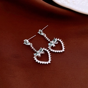 Silver needle bowknot earrings with blue heart tassel and sparkling zircon crystal