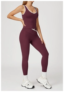 Detail of burgundy yoga set with contrast piping and V-shape crossover waistband