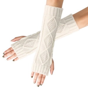 Detailed close-up of cream knit arm warmers with classic diamond cable pattern